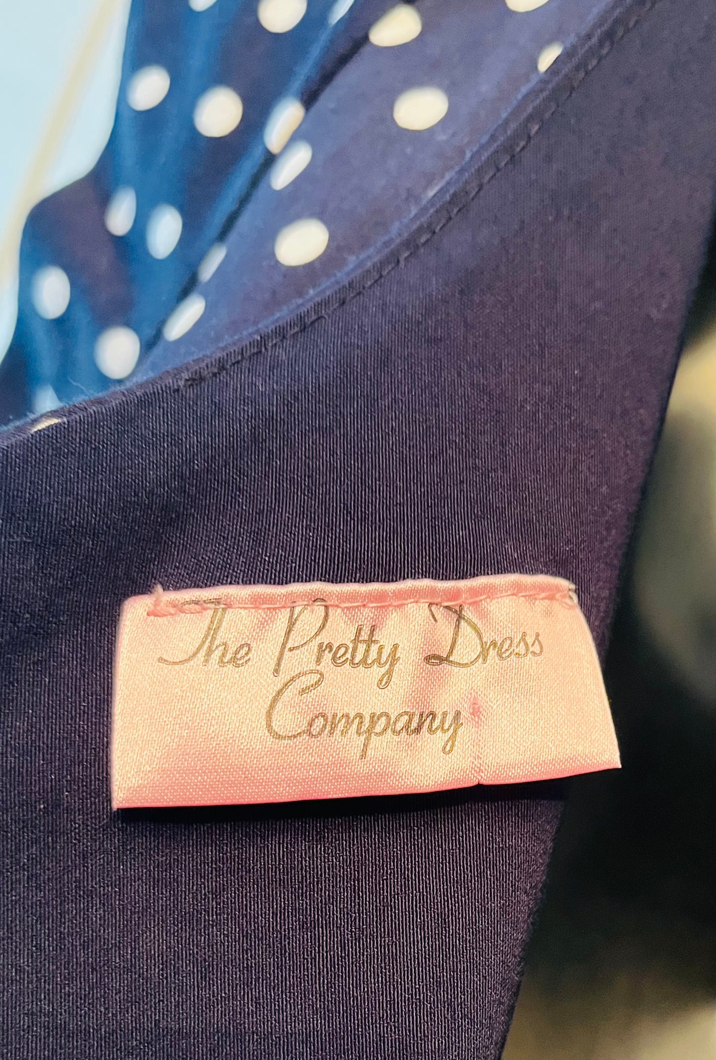 The Pretty Dress Company Navy and white polka wiggle dress