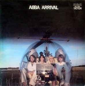 Album cover of 'Arrival' by ABBA featuring four people in a transparent bubble over a helicopter.