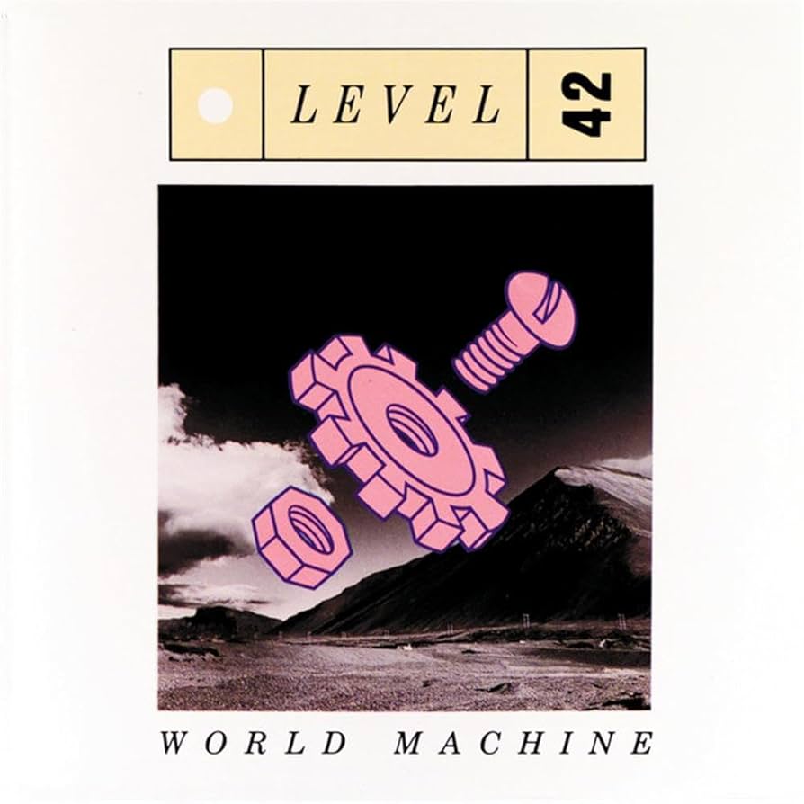 Album cover with pink gears and mountain landscape, featuring 'Level 42' and 'World Machine'.